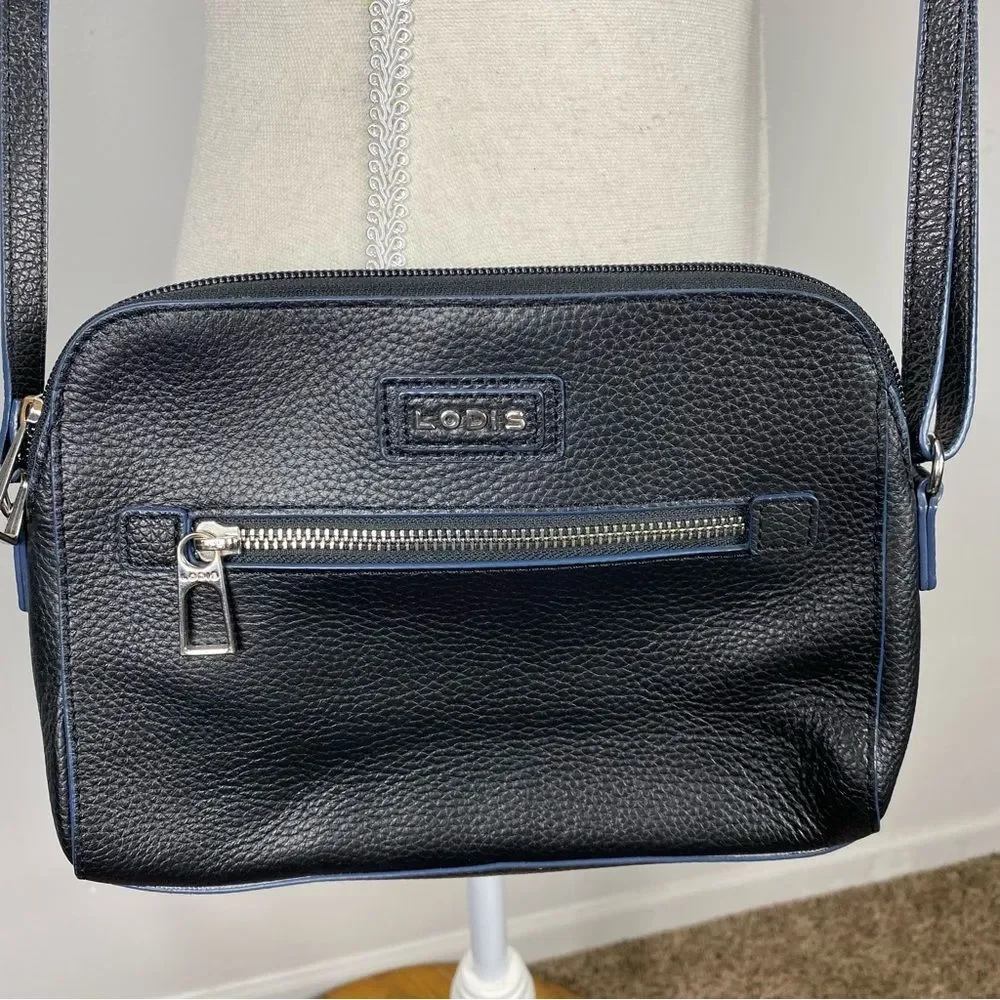 Lodis Charlotte crossbody bag in black pebble-grain leather with navy blue trim